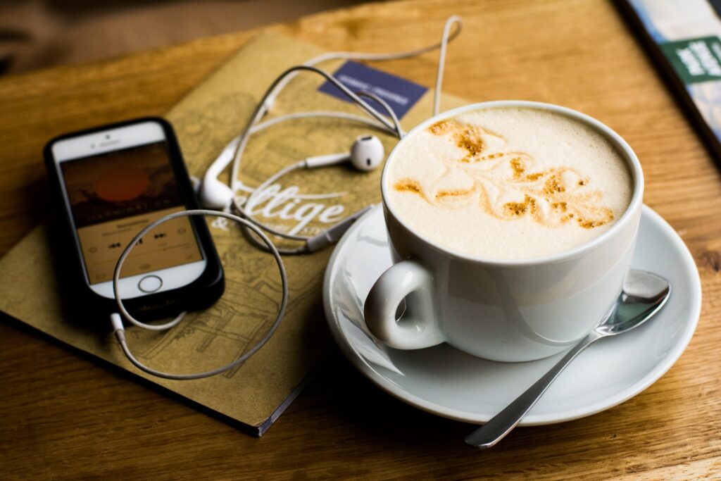 coffee and audiobooks - Photo by Juja Han on Unsplash