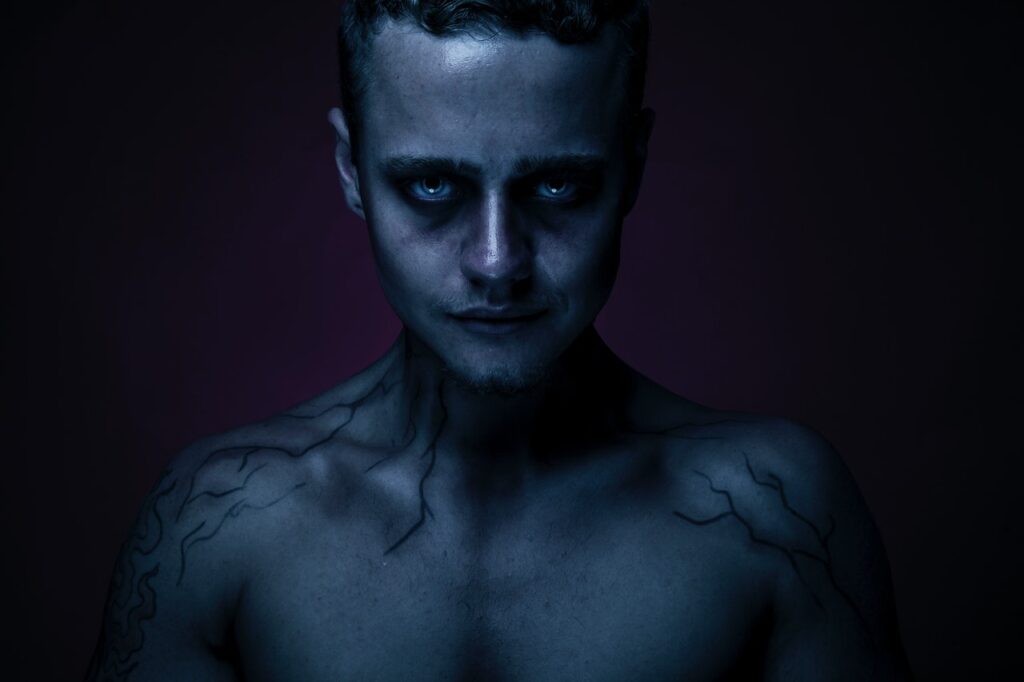 A picture of a young man as a dark villain - Photo by imustbedead at Pexels