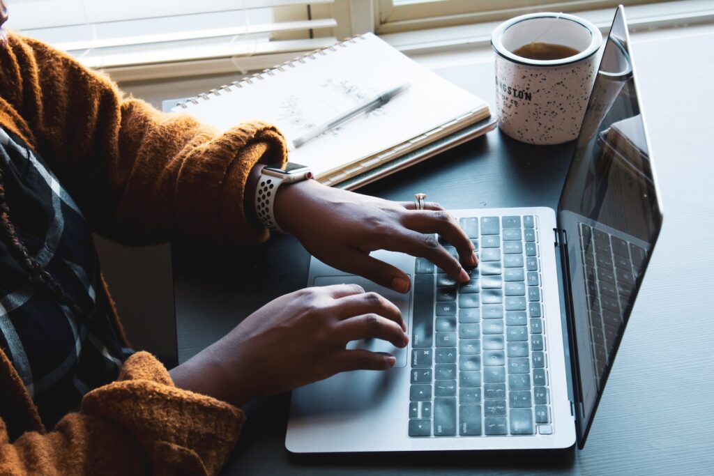 woman editing on a laptop - Photo by Daniel Thomas on Unsplash