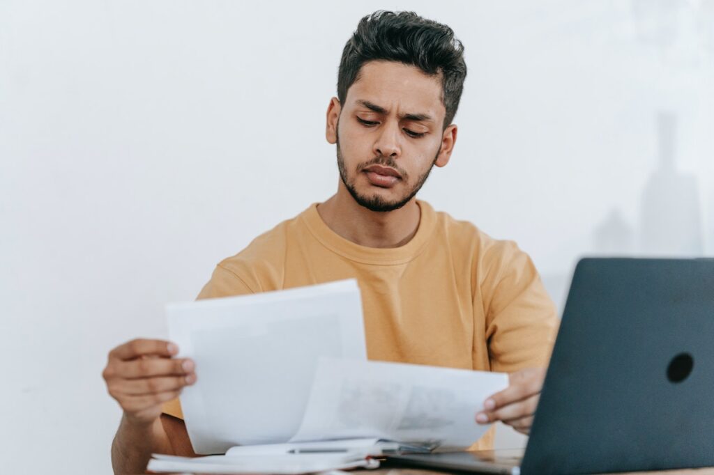 Man receiving rejection letter - Photo by Michael Burrows for Pexels