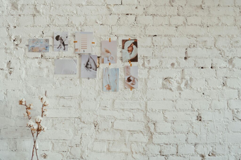 A mood board on a white wall - Photo by cottonbro studio for Pexels